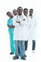 in full growth. smiling young doctors standing one by one