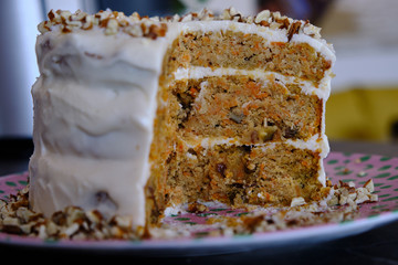 Homemade healthy carrot cake, white frosting, delicious cake, cake slice