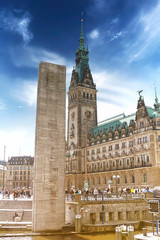 Fototapeta na wymiar Hamburg, Germany : The City Hall (German: Rathaus) in downtown Hamburg, Germany, on the Rathausmarkt square on a sunny spring day. It is the seat of the government of Hamburg.