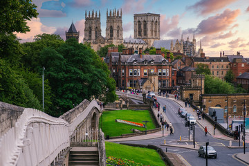 Fototapeta na wymiar The city of York, its medieval wall and the York Minster at sunset