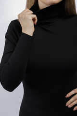 young woman in black suit