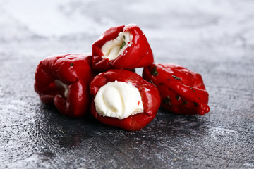 stuffed capsicum with cottage cheese with herbs and olive oil. antipasti snack