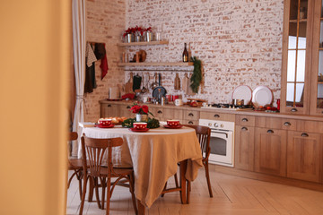 Beautiful kitchen interior with served dining table