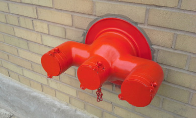 Red Fire Hydrant on the Wall