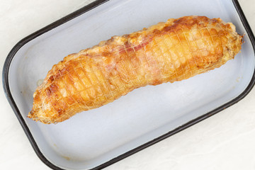 Fried rolled chicken meat with cheese and ham