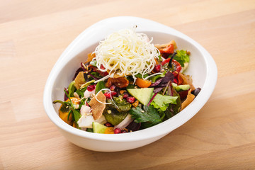 Homemade fattoush salad with vegan cheese toppings. Organic food perfect for delivery. Food photography. Arabic dish for vegetarian.