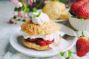 Homemade Strawberry shortcake with stuffed cream topping, selective focus