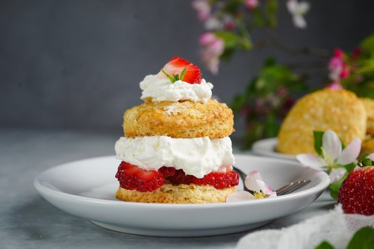 Homemade Strawberry shortcake with stuffed cream topping, selective focus