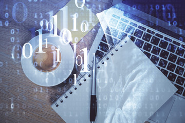 Double exposure of data drawing hologram over topview of study desk background with computer. Concept of Ai.