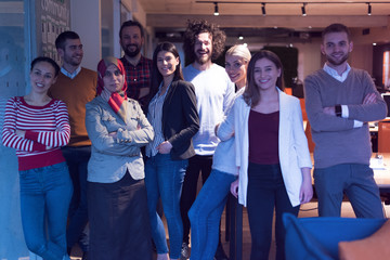 Portrait of pretty successful multi-ethnic corporate close-knit team concept, arabian european african ethnicity office workers pose look at camera four highly paid skilled specialists command indoors