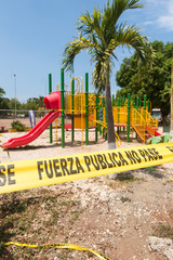 Childrens play area closed with police tape in Guanacaste, Costa Rica during Covid-19