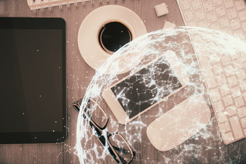 Double exposure of social network theme drawing over table with phone. Top view. People connecting...