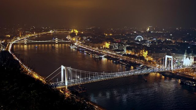 Budapest in the evening, decorative lighting and bridges - aerial view.