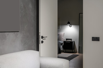 Interior of illuminated modern flat with different walls