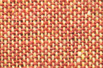 Fabric macro texture. knitted material. woven background. woolen textile close up
