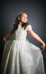 Fototapeta na wymiar Gorgeous young girl dressed in white