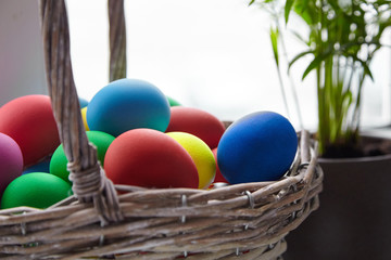 Easter Day, basket with colorful Easter Eggs