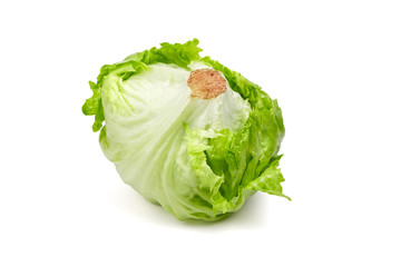 Crisphead lettuce, one whole head of iceberg lettuce, leafy green vegetable isolated on white background