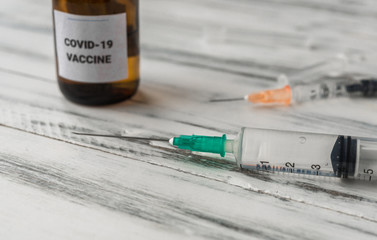 Vaccine against coronavirus covid-19 pandemic in syringes