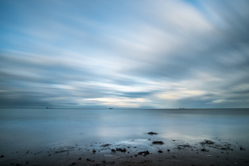 clouds over the sea, long exposure, blurry clouds