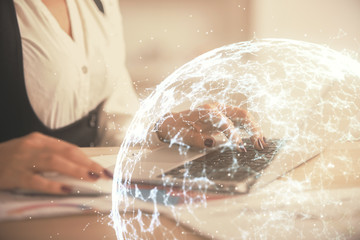 Double exposure of woman hands typing on computer and social network theme hologram drawing. People media concept.