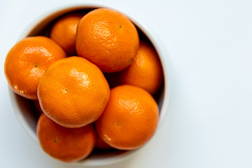 oranges on a white plate