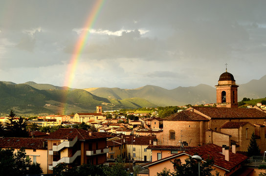 Fabriano city with rainbow after a storm