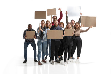 Emotional multicultural group of people screaming while holding blank placards on white background. Women and men shouting, calling. Activism, active citizenship, social life, protesting, human rights