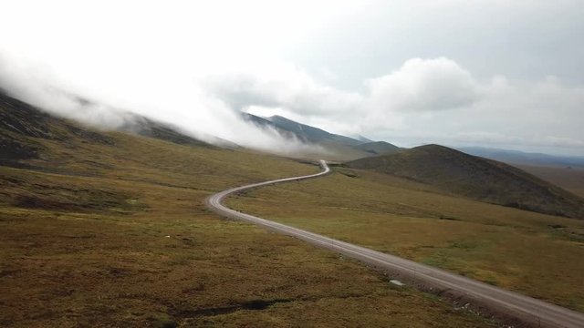 Hitch Hikers on the side of the Dempster Highway in Northern Canada