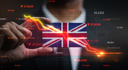 Graph Falling Down in Front Of United Kingdom Flag. Crisis Concept