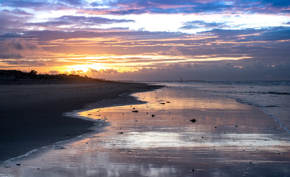 West Wittering beach near Chichester, West Sussex, UK, at sunset. 