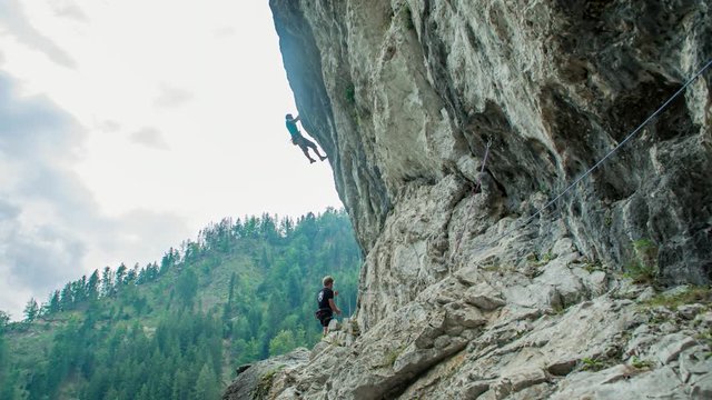 Epic rock climber jump at Burjakove Peci Topla in slow motion