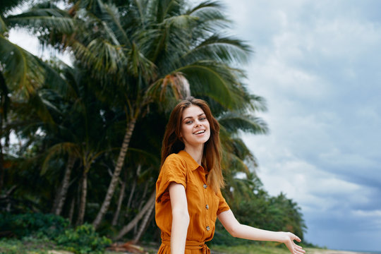 young woman in a tropical garden