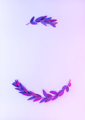 Fototapeta na wymiar Light neon background with leaves. Colorful abstract backdrop with plants frame and space for your text. Exotic nature branch with pink and purple vivid colors. Summer twigs with shiny backlight
