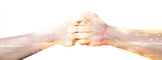 Fototapeta premium 拳と拳がぶつかり合う