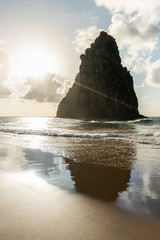 Beautiful Sunset at Cacimba do Padre beach with the view of Dois Irmaos Hill and turquoise clear water, at Fernando de Noronha, Unesco World Heritage site, Pernambuco, Brazil