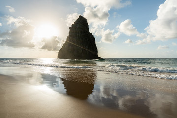 Beautiful Sunset at Cacimba do Padre beach with the view of Dois Irmaos Hill and turquoise clear...