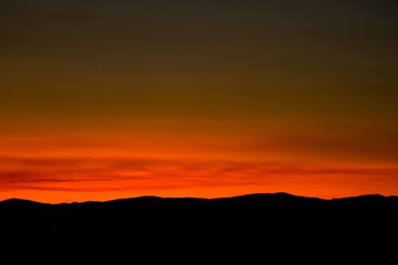 orange sunset mountains silhouette summer