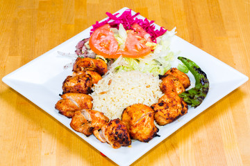 Grilled Chicken with rice, Salad and Green Paper 