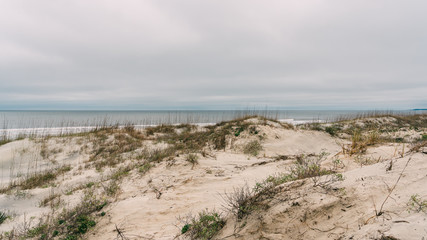 Fototapeta na wymiar Empty beach on a cloudy day