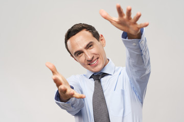 young businessman showing ok sign