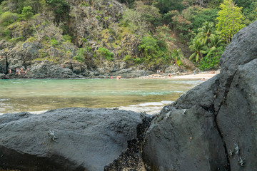 Beautiful Rocks with crabs at Cachorro Beach, Fernando de Noronha Marine National Park, a Unesco World Heritage site, Pernambuco, Brazil