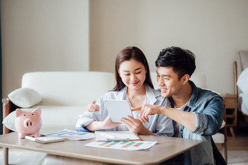 Asian couple at home Financial management