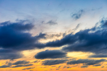 Sky with cloud and sun ray yellow and blue color background. With copy space for text or design.