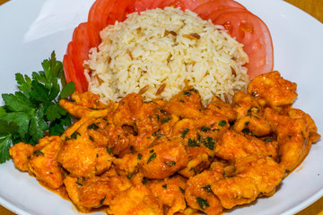 Garlic Chicken Turkish style with Rice and Tomatoes 
