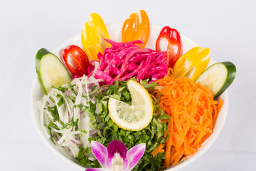 Various fresh mix salad leaves with tomato in bowl 