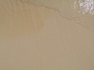 Perfect fine sand from the shores of a peaceful beach in Riviera Maya, Mexico.