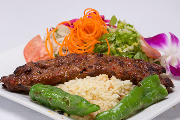 Traditional Adana Kebap with salad 