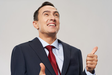 businessman showing thumbs up sign