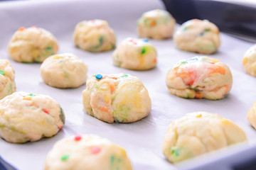 Baking tray with uncooked cookies, closeup